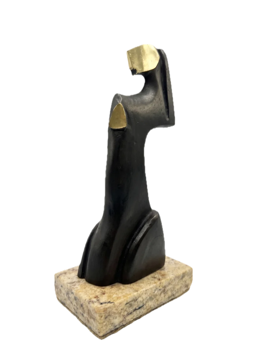 Reposo · Bronce y latón